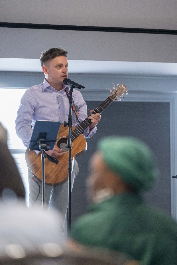 Mike Macdermid singing live during a wedding drinks reception
